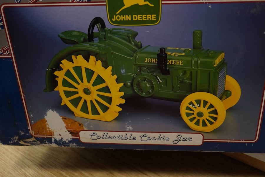 A boxed Enesco collectible cookie jar (biscuit barrel) in the form of a John Deere tractor